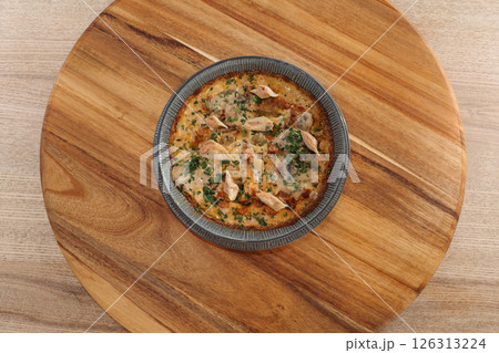 ravioli dish on wooden background ravioli dish on wooden background 126313224