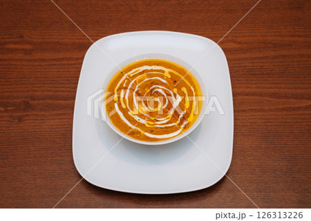 chicken korma in white plate 126313226