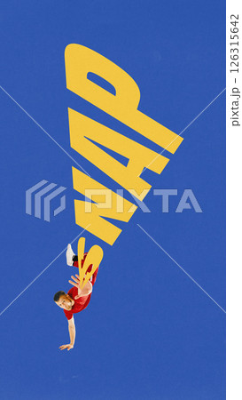 Poster. Modern art design. Danceer flipping with giant yellow SNAP typography on blue background showing dynamic motion. Poster. Modern art design. Danceer flipping with giant yellow SNAP typography on blue background showing dynamic motion. 126315642