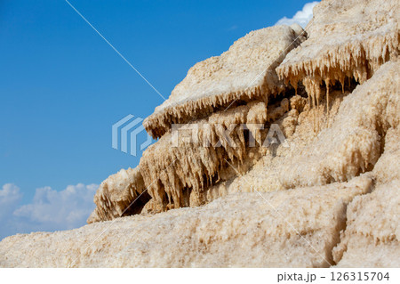 Natural salt stalactites crystals at the Dead Sea 126315704