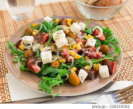 Fresh vegetarian healthy vegetable salad with arugula and chees Fresh vegetarian healthy vegetable salad with arugula and chees 126319162