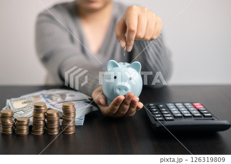 Finance bank tax expense accounting budget money businessman hand use calculator Financial calculate accountant close up calculator with graph chart write office desk Business expense analysis saving Finance bank tax expense accounting budget money businessman hand use calculator Financial calculate accountant close up calculator with graph chart write office desk Business expense analysis saving 126319809