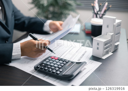 Finance bank tax expense accounting budget money businessman home for Business expense analysis saving use Financial calculate accountant close up calculator with graph chart hand write office desk Finance bank tax expense accounting budget money businessman home for Business expense analysis saving use Financial calculate accountant close up calculator with graph chart hand write office desk 126319916