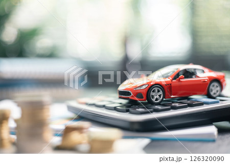 Finance bank tax expense accounting budget money businessman hand for Business expense analysis saving use car Financial calculate accountant close up calculator with graph chart write office desk 126320090