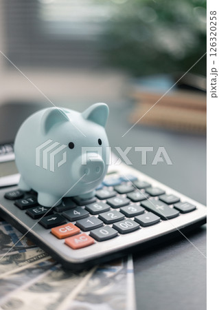 Finance bank tax expense accounting budget money businessman hand use calculator Financial calculate accountant close up calculator with graph chart write office desk Business expense analysis saving Finance bank tax expense accounting budget money businessman hand use calculator Financial calculate accountant close up calculator with graph chart write office desk Business expense analysis saving 126320258