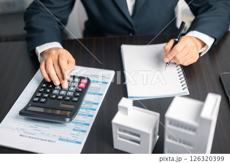 Finance bank tax expense accounting budget money businessman home for Business expense analysis saving use Financial calculate accountant close up calculator with graph chart hand write office desk Finance bank tax expense accounting budget money businessman home for Business expense analysis saving use Financial calculate accountant close up calculator with graph chart hand write office desk 126320399