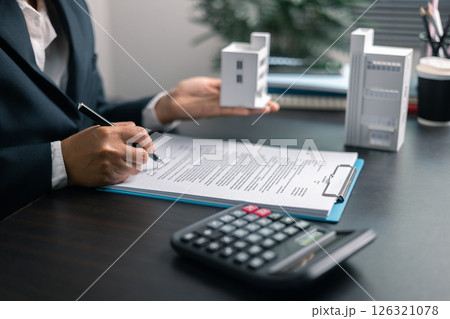 Finance bank tax expense accounting budget money businessman home for Business expense analysis saving use Financial calculate accountant close up calculator with graph chart hand write office desk Finance bank tax expense accounting budget money businessman home for Business expense analysis saving use Financial calculate accountant close up calculator with graph chart hand write office desk 126321078