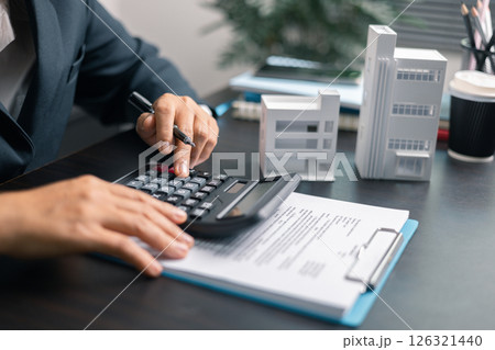 Finance bank tax expense accounting budget money businessman home for Business expense analysis saving use Financial calculate accountant close up calculator with graph chart hand write office desk Finance bank tax expense accounting budget money businessman home for Business expense analysis saving use Financial calculate accountant close up calculator with graph chart hand write office desk 126321440