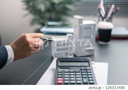 Finance bank tax expense accounting budget money businessman home for Business expense analysis saving use Financial calculate accountant close up calculator with graph chart hand write office desk Finance bank tax expense accounting budget money businessman home for Business expense analysis saving use Financial calculate accountant close up calculator with graph chart hand write office desk 126321480