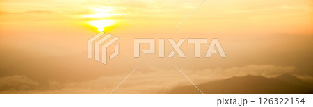 Mountain landscape. foggy morning. High angle view of trees in forest during foggy weather. Beautiful mountain and cloud natural landscape at sunrise in Thailand. panoramic banner with copy space. Mountain landscape. foggy morning. High angle view of trees in forest during foggy weather. Beautiful mountain and cloud natural landscape at sunrise in Thailand. panoramic banner with copy space. 126322154
