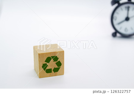 Recycle symbol with wooden blocks on a white background. Promoting reuse, reduce, and recycle for sustainability 126322757
