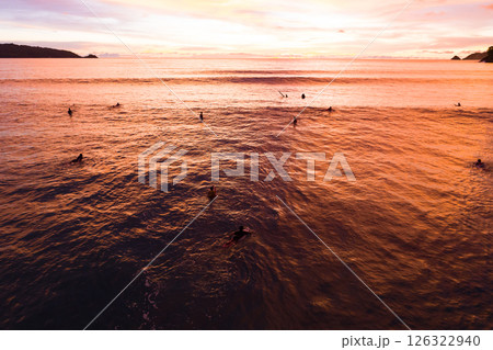 Aerial view sunset sky,Nature beautiful light sunset or sunrise over sea,Colorful dramatic majestic scenery sunset Sky with Amazing clouds and waves texture colorful sky cloud background Aerial view sunset sky,Nature beautiful light sunset or sunrise over sea,Colorful dramatic majestic scenery sunset Sky with Amazing clouds and waves texture colorful sky cloud background 126322940