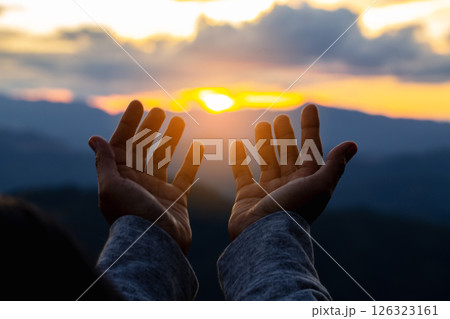 Close up christians hands pray to God with spiritual faith on holy bible in catholic church religion worship prayer ask god bless pray grace jesus believe Christianity religion prayer holy worship. 126323161