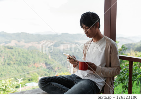 Future remote work combines technology nature smart phone enable e learning productivity while traveling blending comfort modern devices serenity computer equipment business connection natural world Future remote work combines technology nature smart phone enable e learning productivity while traveling blending comfort modern devices serenity computer equipment business connection natural world 126323180