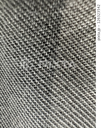 Close up of a black and white fabric with a lot of texture Close up of a black and white fabric with a lot of texture 126323542
