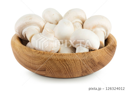 Fresh mushroom champignon in a wooden bowl isolated on white background 126324012
