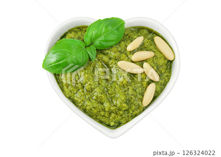 Pesto sauce in ceramic bowl isolated on white background. Top view. Flat lay. Pesto sauce in ceramic bowl isolated on white background. Top view. Flat lay. 126324022