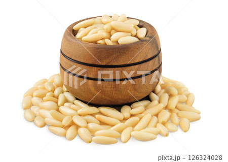 Shelled European pine nuts in wooden bowl isolated on white background with full depth of field 126324028