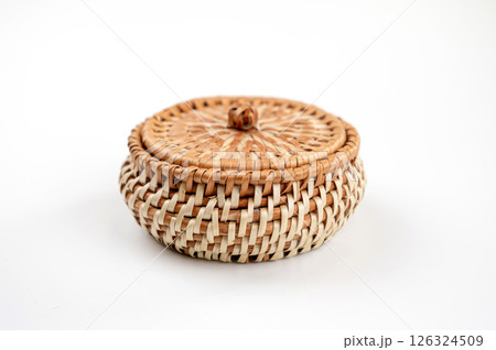 Wicker basket with lid on a white background, isolate, close-up Wicker basket with lid on a white background, isolate, close-up 126324509
