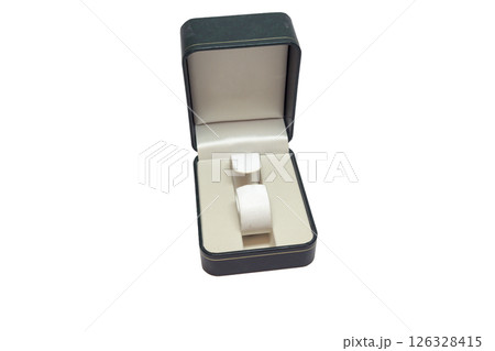 watch storing box, upholstered in silk on the inside with fabric-covered ring for wristband. isolated on white background watch storing box, upholstered in silk on the inside with fabric-covered ring for wristband. isolated on white background 126328415