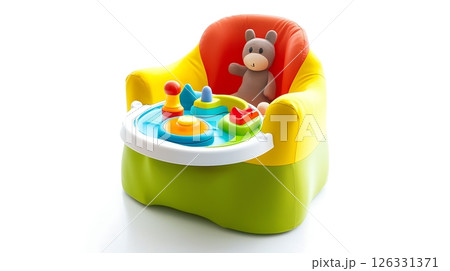 A green and yellow chair with a stuffed animal on it 126331371
