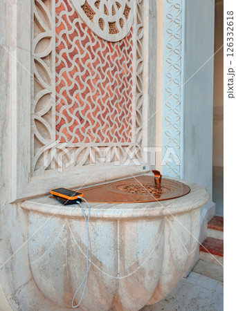 Mobile Phone On A Fountain In A Mosque 126332618