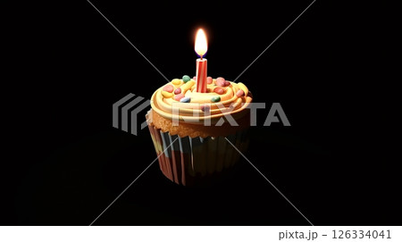 Single cupcake with lit candle celebrating a birthday 126334041