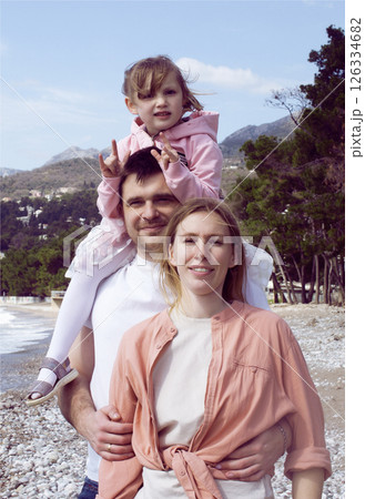 lifestyle happy family on beach having nice vacation time lifestyle happy family on beach having nice vacation time 126334682