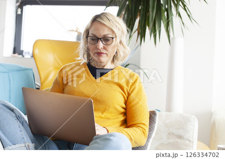 an adult woman working in home interior, lifestyle people concept 126334702