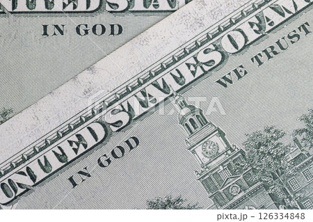 genuine American banknote with a face value of one hundred US dollars, part of a paper bill of American dollars genuine American banknote with a face value of one hundred US dollars, part of a paper bill of American dollars 126334848