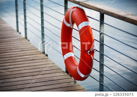 Lifebuoy on the railing 126335073