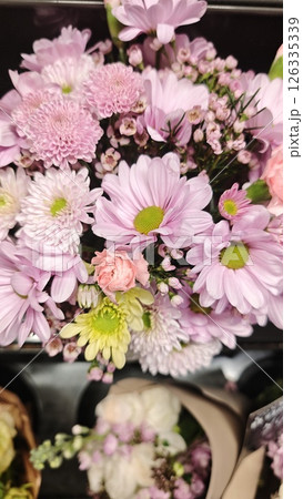 Delicate bouquet of daisies, chrysanthemums Delicate bouquet of daisies, chrysanthemums 126335339