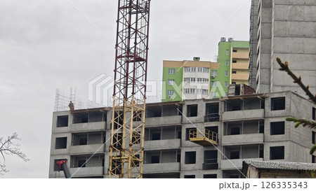 Multi-story concrete building under construction Multi-story concrete building under construction 126335343
