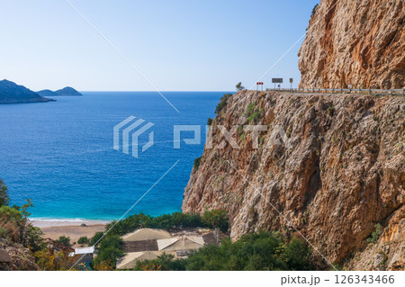 Aerial view of Kaputas beach with turquoise sea water and white sand, Lycia coast. Summer relaxing day at family vacation in Mediterranean Sea, Kas, Antalya region, Turkey 126343466