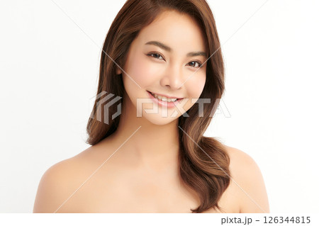 A beautiful young Asian woman with clean, fresh skin against a white background. Skincare, facial treatment, cosmetology, beauty, and spa. An elegant portrait of an Asian woman. A beautiful young Asian woman with clean, fresh skin against a white background. Skincare, facial treatment, cosmetology, beauty, and spa. An elegant portrait of an Asian woman. 126344815