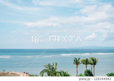 Sanur beach and palm trees in Bali, Indonesia Sanur beach and palm trees in Bali, Indonesia 126344942