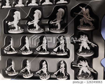 Mozyr, Belarus, 11.06.2024: Black Rose Wars, anti-hero action figures in a gray plastic corex top view. board games Mozyr, Belarus, 11.06.2024: Black Rose Wars, anti-hero action figures in a gray plastic corex top view. board games 126349063
