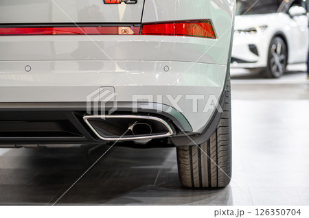 Detail of a luxury car exhaust showcasing modern design at an auto show 126350704