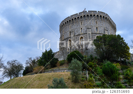 Focused architectural view of Windsor Castle's historic towers and walls in England. Captured in winter with soft light and no people in the frame. Focused architectural view of Windsor Castle's historic towers and walls in England. Captured in winter with soft light and no people in the frame. 126351693