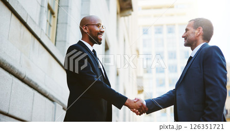 Happy, business people or men in city, handshake or agreement with B2B deal. Contract, employees or outdoor with thank you, shaking hands or welcome with greeting, hello or partnership with smile 126351721