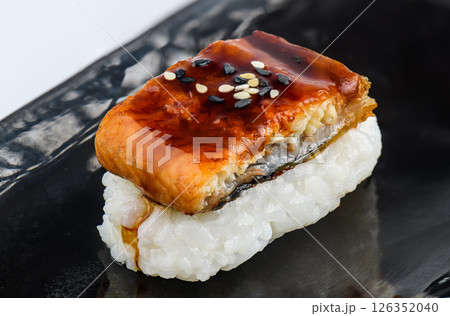 Grilled eel sushi with sweet sauce and sesame Grilled eel sushi with sweet sauce and sesame 126352040
