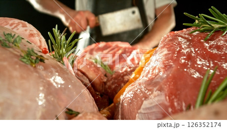 Fresh butcher cut meat assortment. Raw Various Kinds of Meat Served on a Table. Preparation of Meat. Isolated on Black Background. Fresh butcher cut meat assortment. Raw Various Kinds of Meat Served on a Table. Preparation of Meat. Isolated on Black Background. 126352174