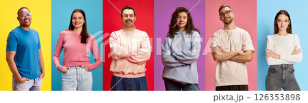 Diverse group of people standing confidently in front of colorful solid backgrounds 126353898
