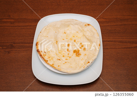 plain naan bread plain naan bread 126355060