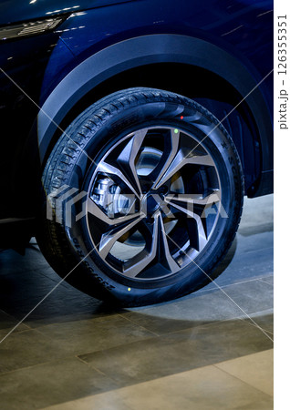 Car wheel with brake calipers and stylish design. Car wheel with brake calipers and stylish design. 126355351