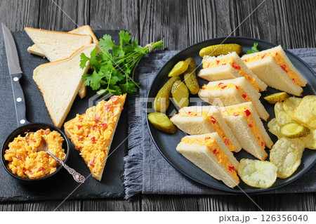 pimento cheese sandwiches with pickles and chips pimento cheese sandwiches with pickles and chips 126356040