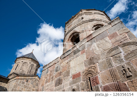 Gergeti Trinity Church near the village of Stepantsminda, popular tourist destination in the Caucasus in Georgia 126356154