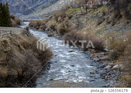 Town of Stepantsminda and Terek river valley on the Georgian Military Road, major route through the Caucasus mountains from Georgia to Russia 126356179
