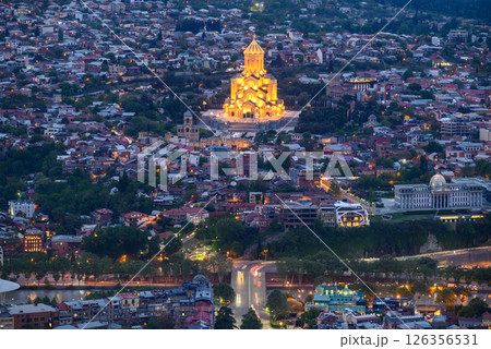 Night view of illuminated Holy Trinity Cathedral and the cityscape of Tbilisi, the capital of Georgia Night view of illuminated Holy Trinity Cathedral and the cityscape of Tbilisi, the capital of Georgia 126356531