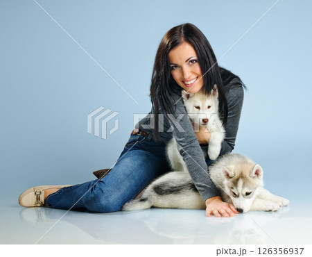 woman and puppy 126356937